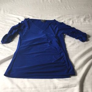 A blue formal shirt from dots